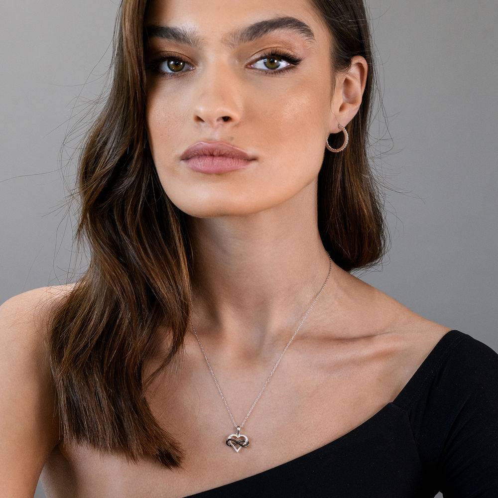 test 1/10 CT. T.W. Diamond Heart Pendant in Sterling Silver with Black Rhodium Plated Infinity Interlocked-1 product photo