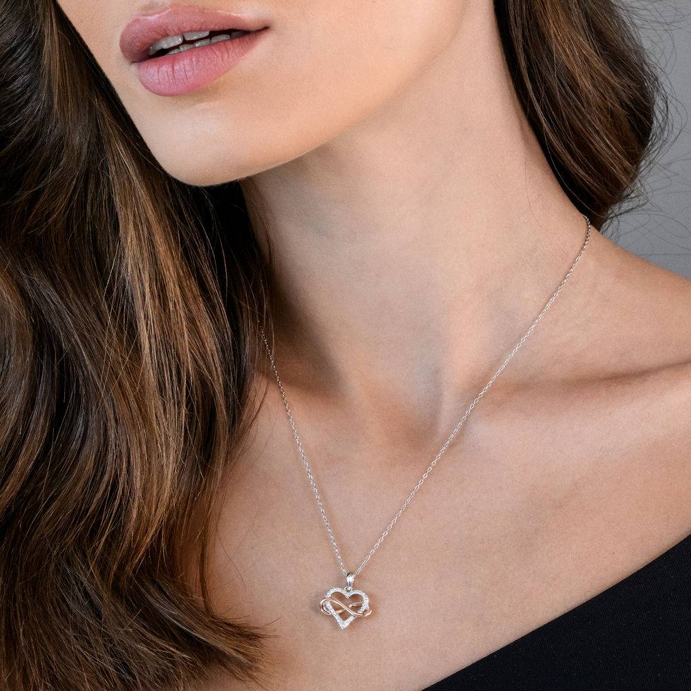 1/10 CT. T.W. Diamond Heart Pendant in Sterling Silver with Rose Gold Plated Infinity Interlocked-3 product photo