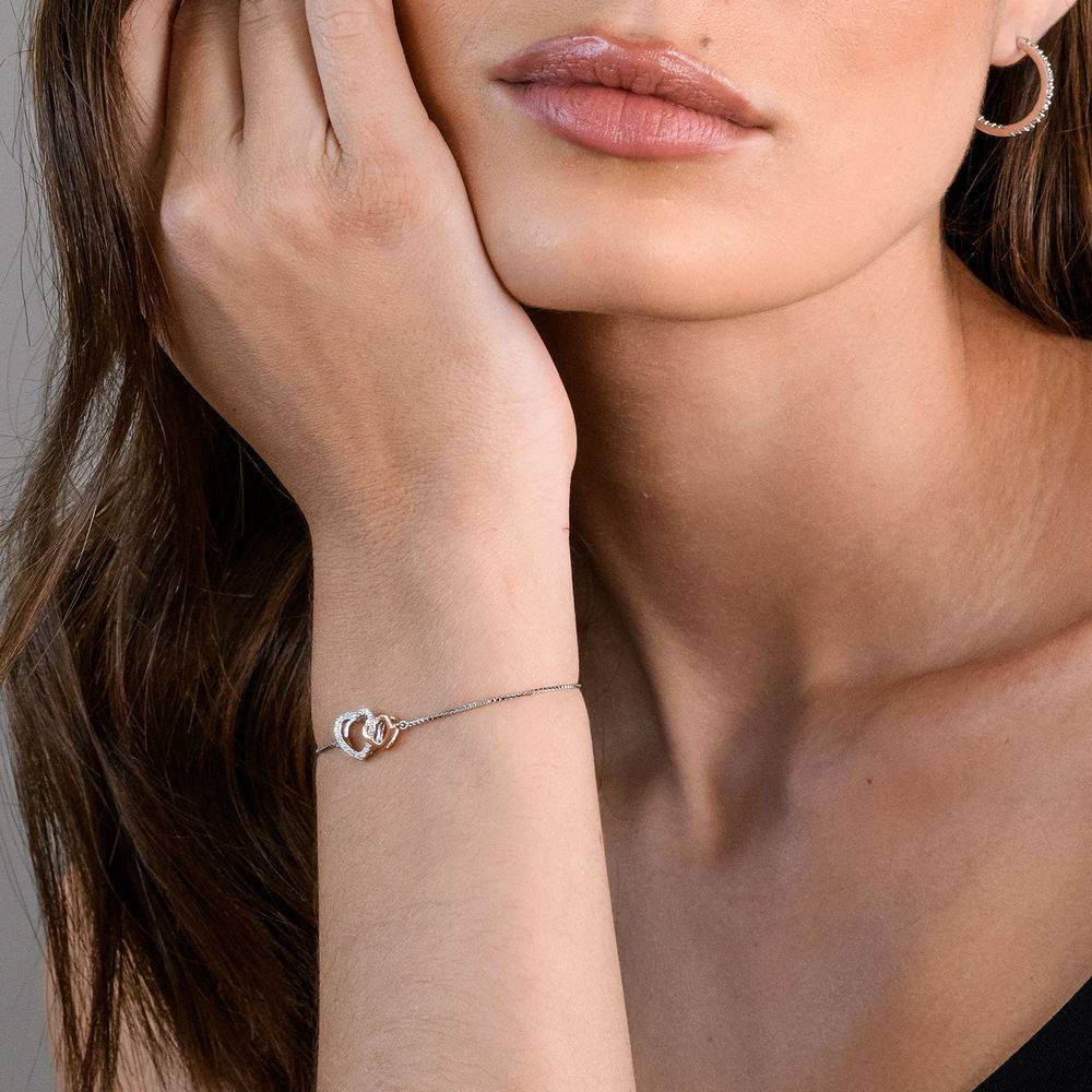 1/10 CT. T.W. Diamond Interlocked Hearts Bolo Bracelet in Sterling Silver and Rose Gold Plated-3 product photo
