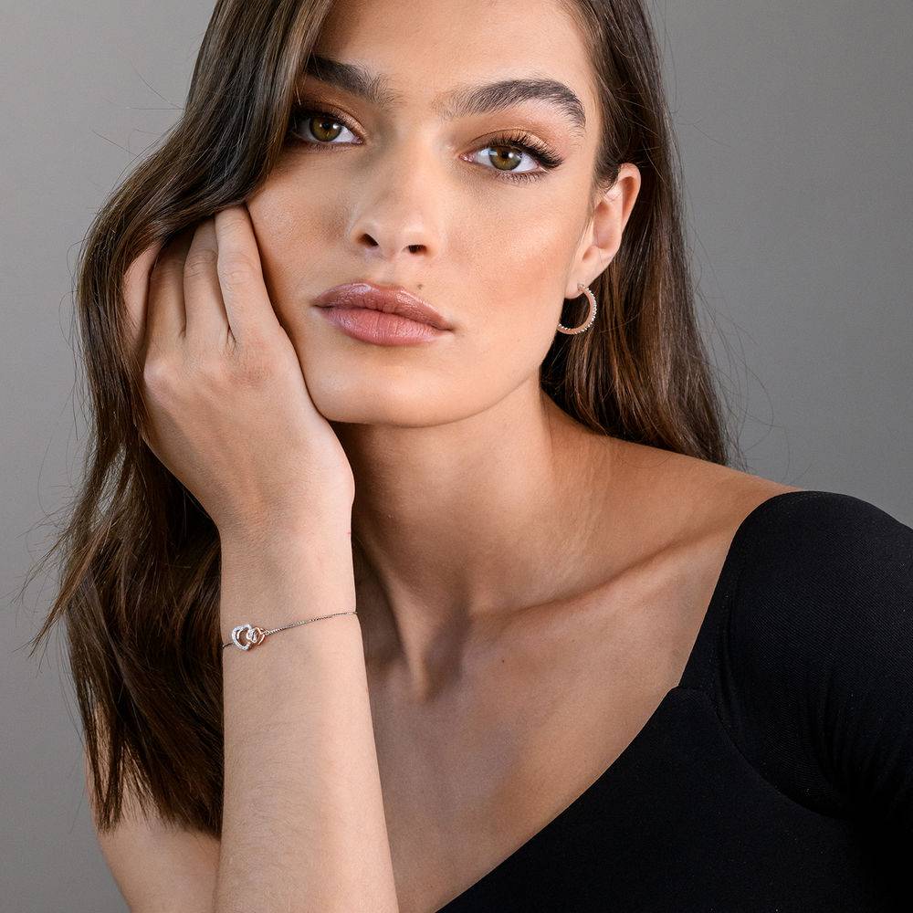 1/10 CT. T.W. Diamond Interlocked Hearts Bolo Bracelet in Sterling Silver and Rose Gold Plated-4 product photo