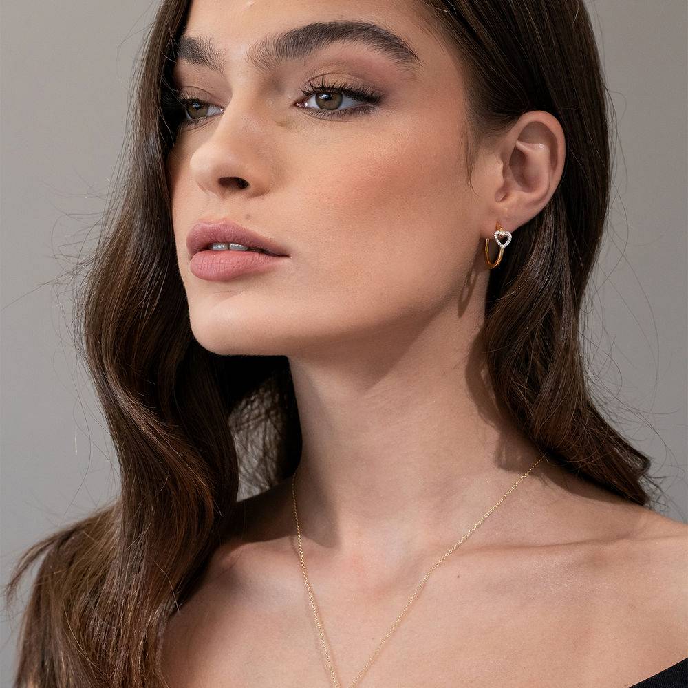 1/10 CT. T.W. Diamond Mini Heart Hoop Earrings in Gold Plated Sterling Silver-2 product photo