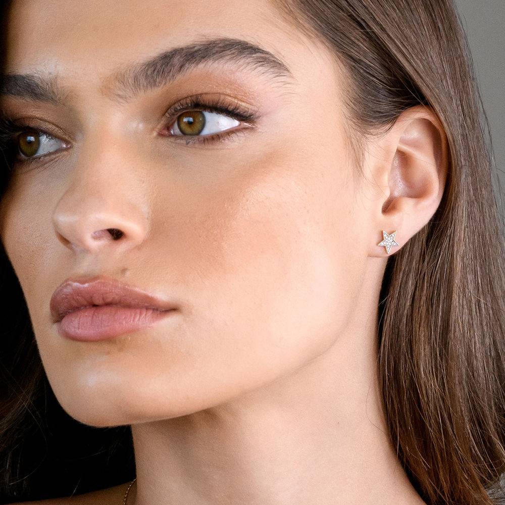 1/10 CT. T.W. Diamond Star Stud Earrings in 10k Yellow Gold-1 product photo