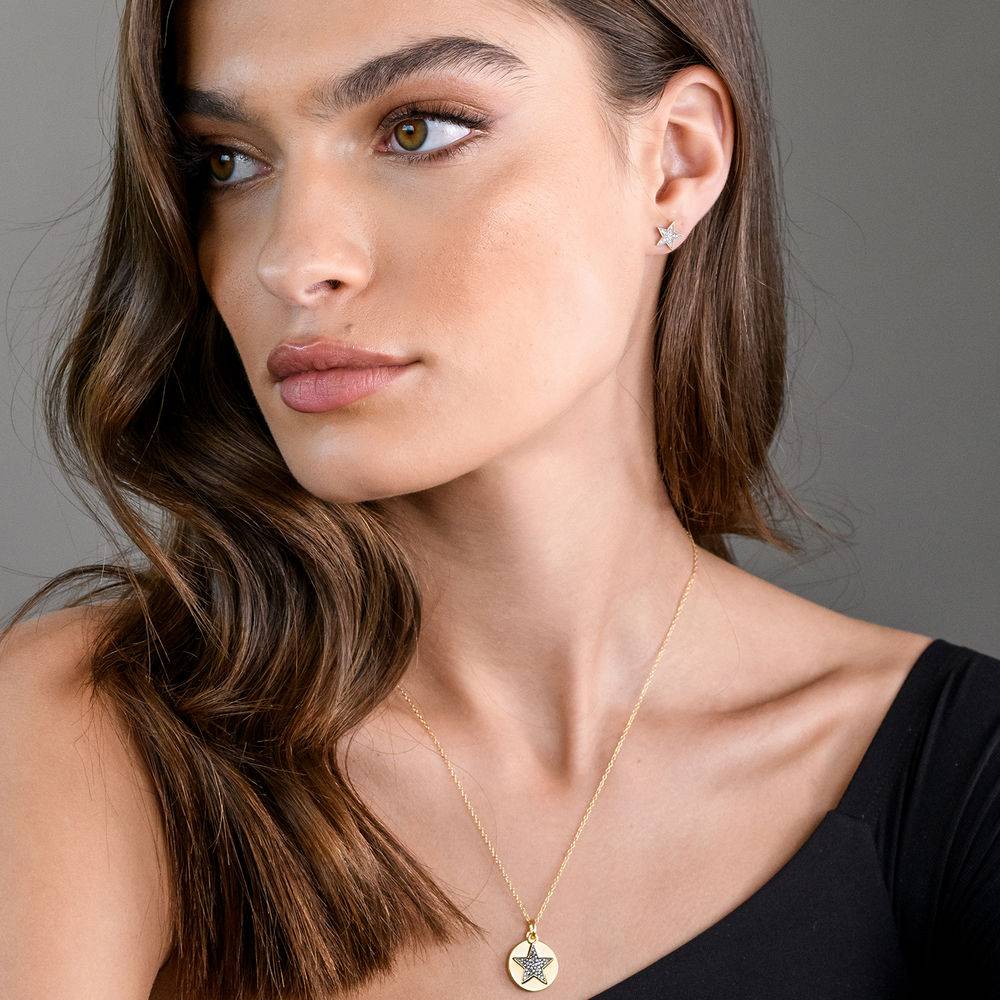 1/10 CT. T.W. Diamond Star Stud Earrings in 10k Yellow Gold-2 product photo