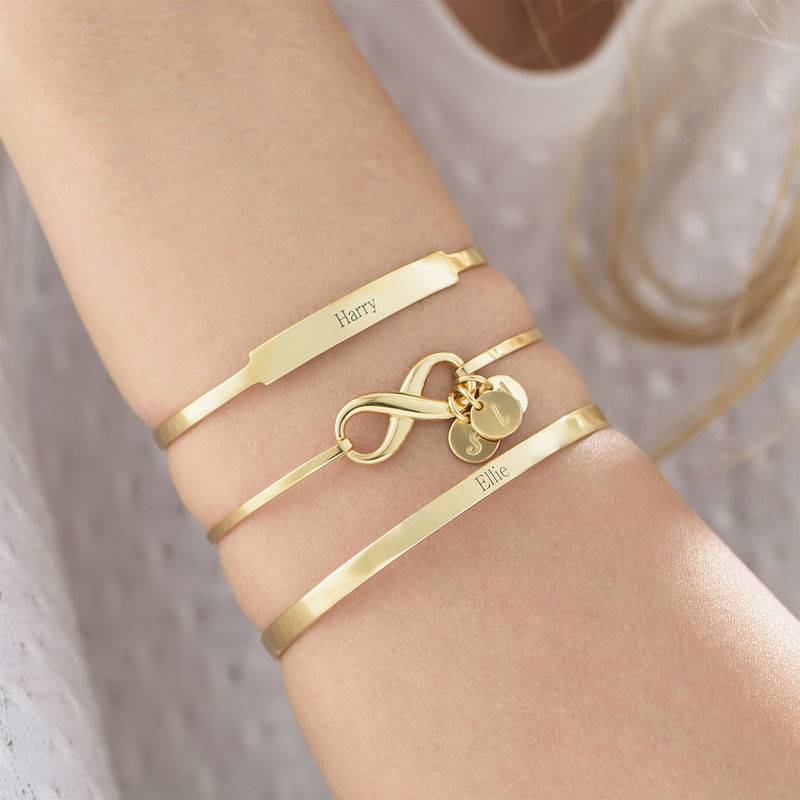 Infinity Bangle Bracelet with Initial Charms in Gold Plating-4 Infinity Bangle Bracelet with Initial Charms in Gold Plating-4 product photo