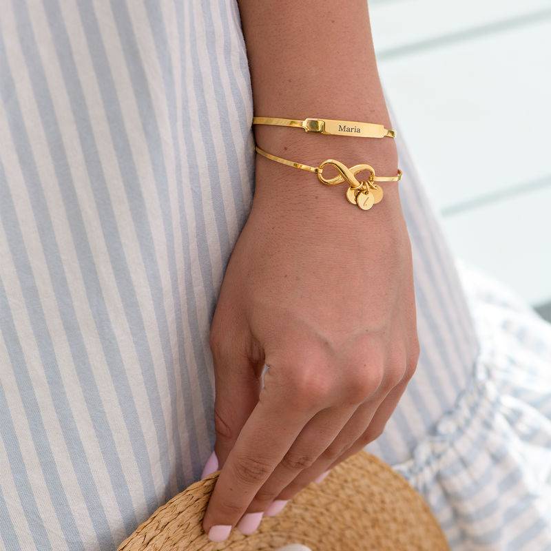 Infinity Bangle Bracelet with Initial Charms in Gold Plating-5 Infinity Bangle Bracelet with Initial Charms in Gold Plating-5 product photo