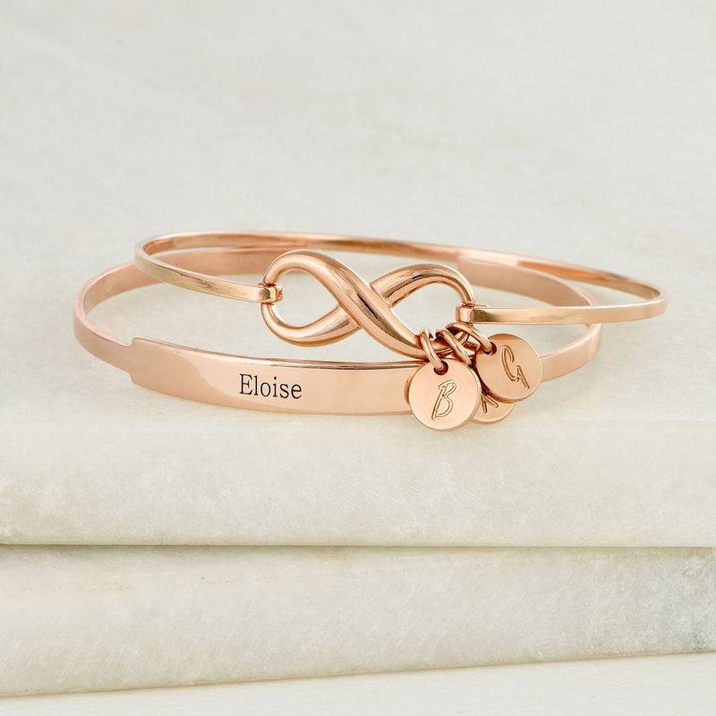 Infinity Bangle Bracelet with Initial Charms in Rose Gold Plating-5 product photo
