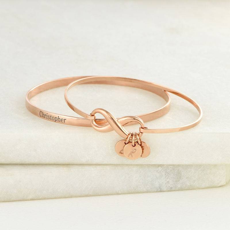 Infinity Bangle Bracelet with Initial Charms in Rose Gold Plating-6 product photo